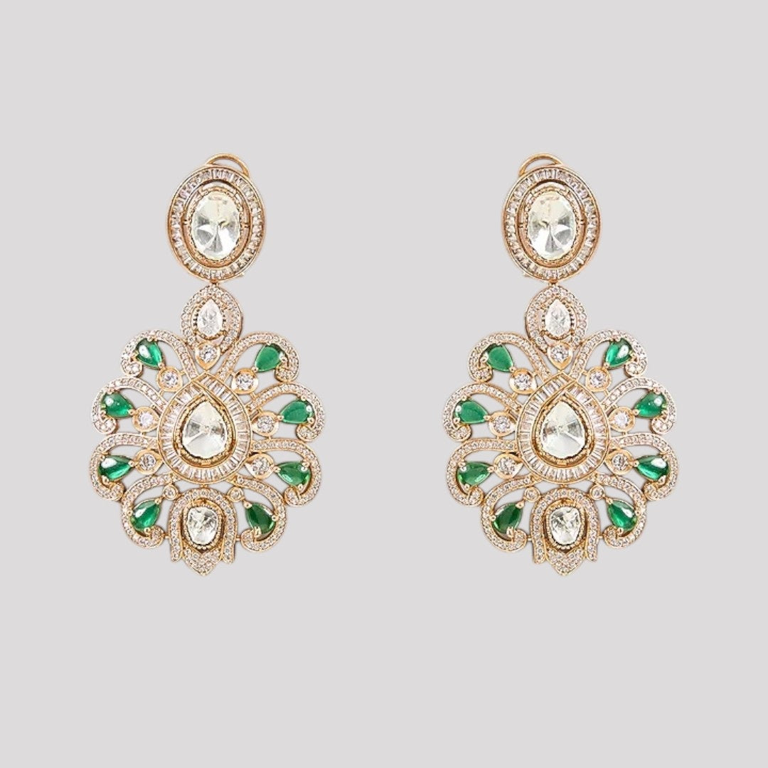 "Green Kundan and Polki bridal necklace set with floral pendant and matching earrings on a gold-toned base."