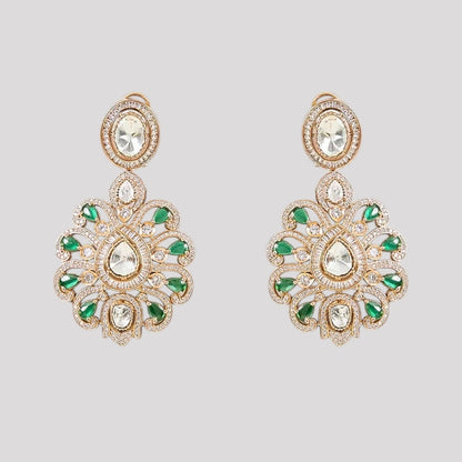 "Green Kundan and Polki bridal necklace set with floral pendant and matching earrings on a gold-toned base."