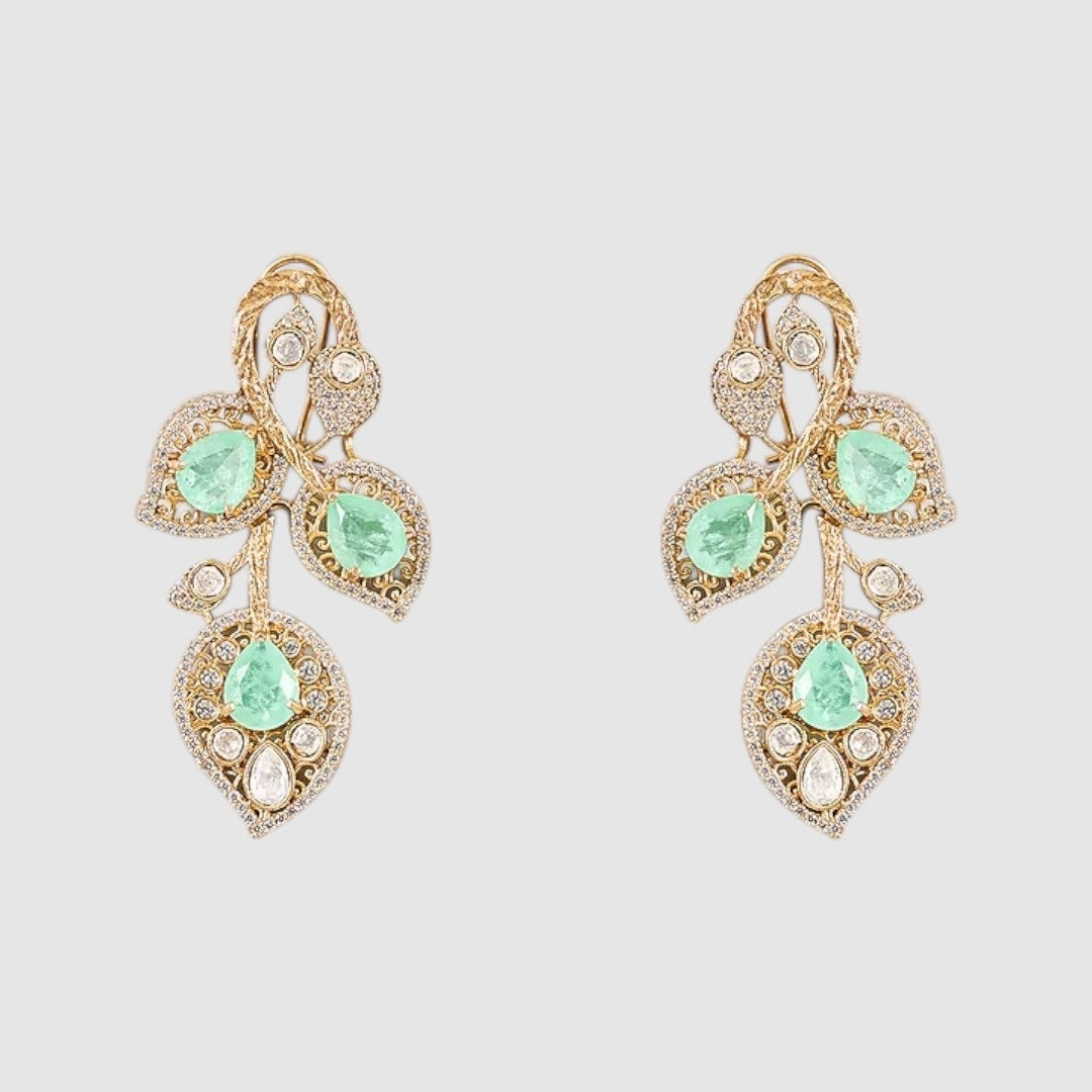 Mint green and white stone leaf-design necklace set with matching earrings.