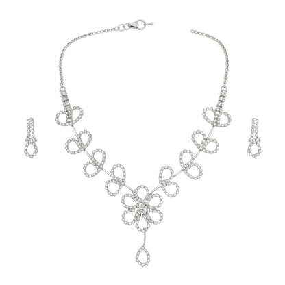 Floral diamond-look necklace set with matching earrings on red display stand