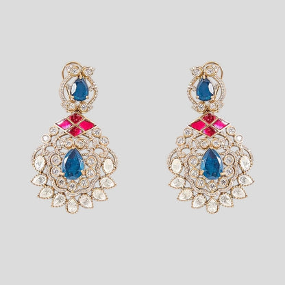 "Gold-plated kundan necklace set with pink inlay, blue teardrop stones, green emerald drops, and matching earrings"