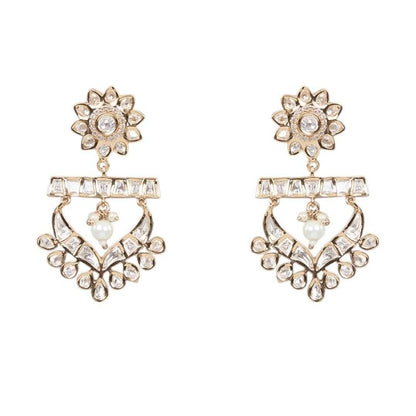 Gold-tone American Diamond designer necklace with textured stone detailing, statement pendant, and matching drop earrings styled on a model.