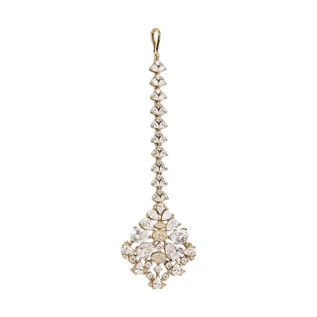 Gold finish American diamond maang tikka with clear pear-cut zircon stones, pave zircon accents and a leaf-shaped zircon chain – Auraa Trends