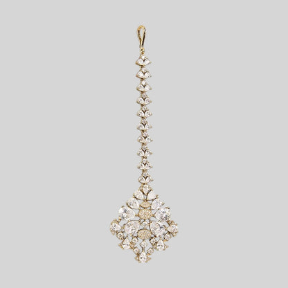 Gold finish American diamond maang tikka with clear pear-cut zircon stones, pave zircon accents and a leaf-shaped zircon chain – Auraa Trends