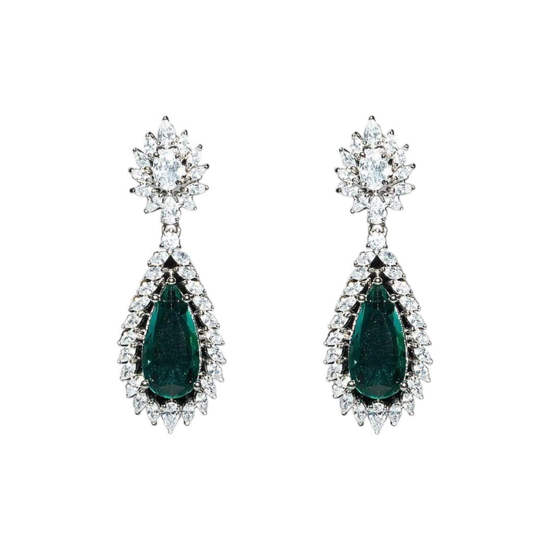 Emerald green teardrop dangle earrings with sparkling crystal floral halo design

