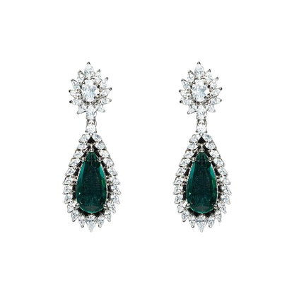 Emerald green teardrop dangle earrings with sparkling crystal floral halo design

