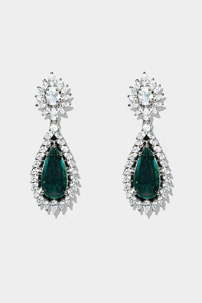 Emerald green teardrop dangle earrings with sparkling crystal floral halo design

