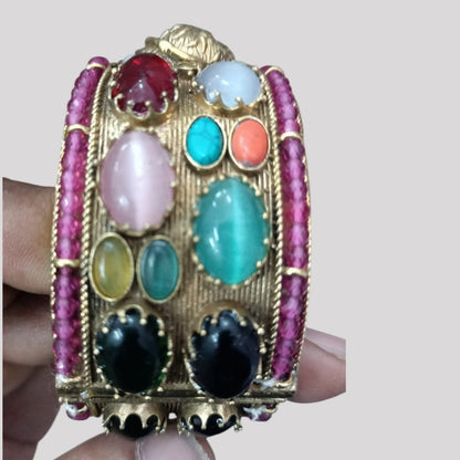 Antique gold-plated Navratna bangle with multi-colored gemstones
