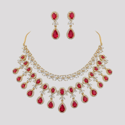 “Gold-plated necklace set with red ruby teardrop stones and matching earrings for women.”