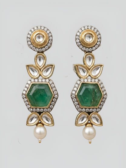 Premium Kundan craftsmanship with floral detailing Elegant green stone centerpiece design