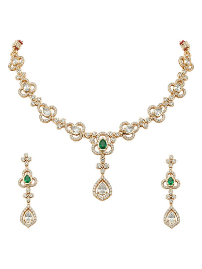 Gold-plated necklace set featuring green stones, American diamonds, floral motifs, and matching drop earrings for women.