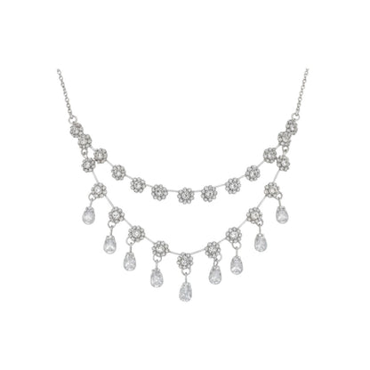 Elegant floral necklace set with matching earrings, silver-plated with crystal details.
