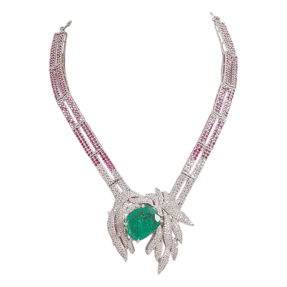 Emerald and diamond leaf design necklace and earrings set with ruby-pink accents on silver base – luxury women’s jewelry set
