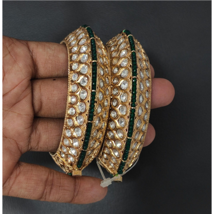 Royal gold-plated Kundan bangles with green stone border – traditional bridal kada set for women