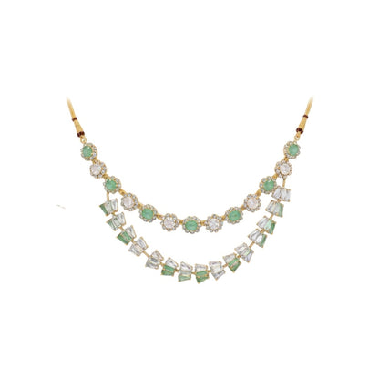 Gold-plated green and white American diamond necklace set with matching earrings on red display stand"