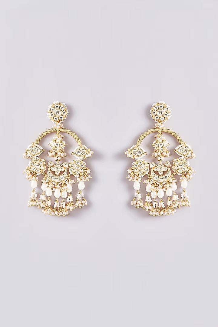 Gold kundan chandbali earrings with pearl beadwork and jhumka-style drops