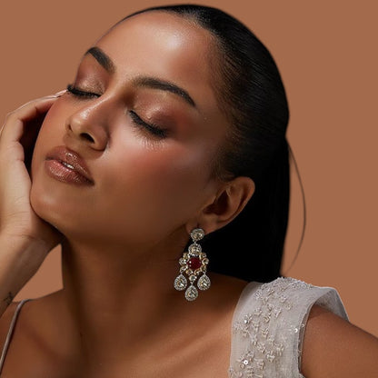 Ruby red cabochon polki chandelier earrings with pear-shaped drops and zircon halo in two-tone gold and silver finish