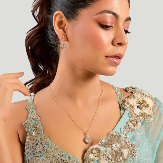 Delicate Diamond Pendant Necklace with Complimentary Drop Earrings - Auraa Trends - Necklace - # - Auraa Trends - wearing a dainty diamond - shaped pendant necklace on a gold chain, accompanied