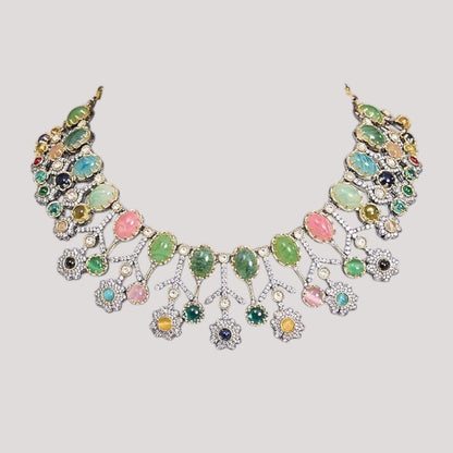 Designer Multicolor Polki Kundan Choker Necklace Set with Earrings for Women - Auraa Trends - Necklace Set -  - Auraa Trends - Woman wearing a handcrafted multicolor polki kundan choker necklace set with matching earrings, paired with a pastel embroidered saree.