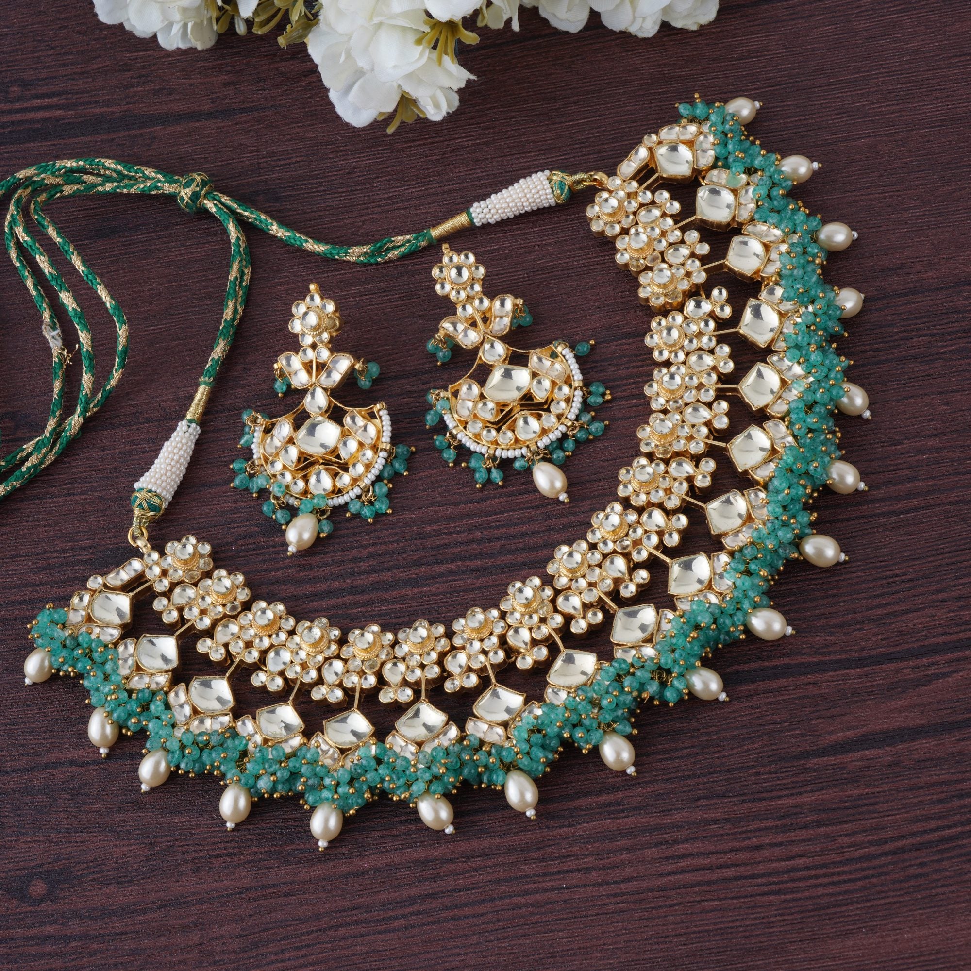 Noble Kundan Necklace Set with Green Embelishments