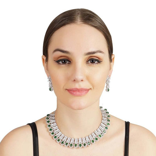 Tantalizing Diamonte Necklace Set with Green Semi Precious Emebelishments