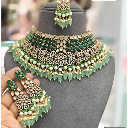 "Bridal Kundan choker necklace set with green beads, pearls, and matching earrings and maang tikka – traditional Indian jewelry for women"