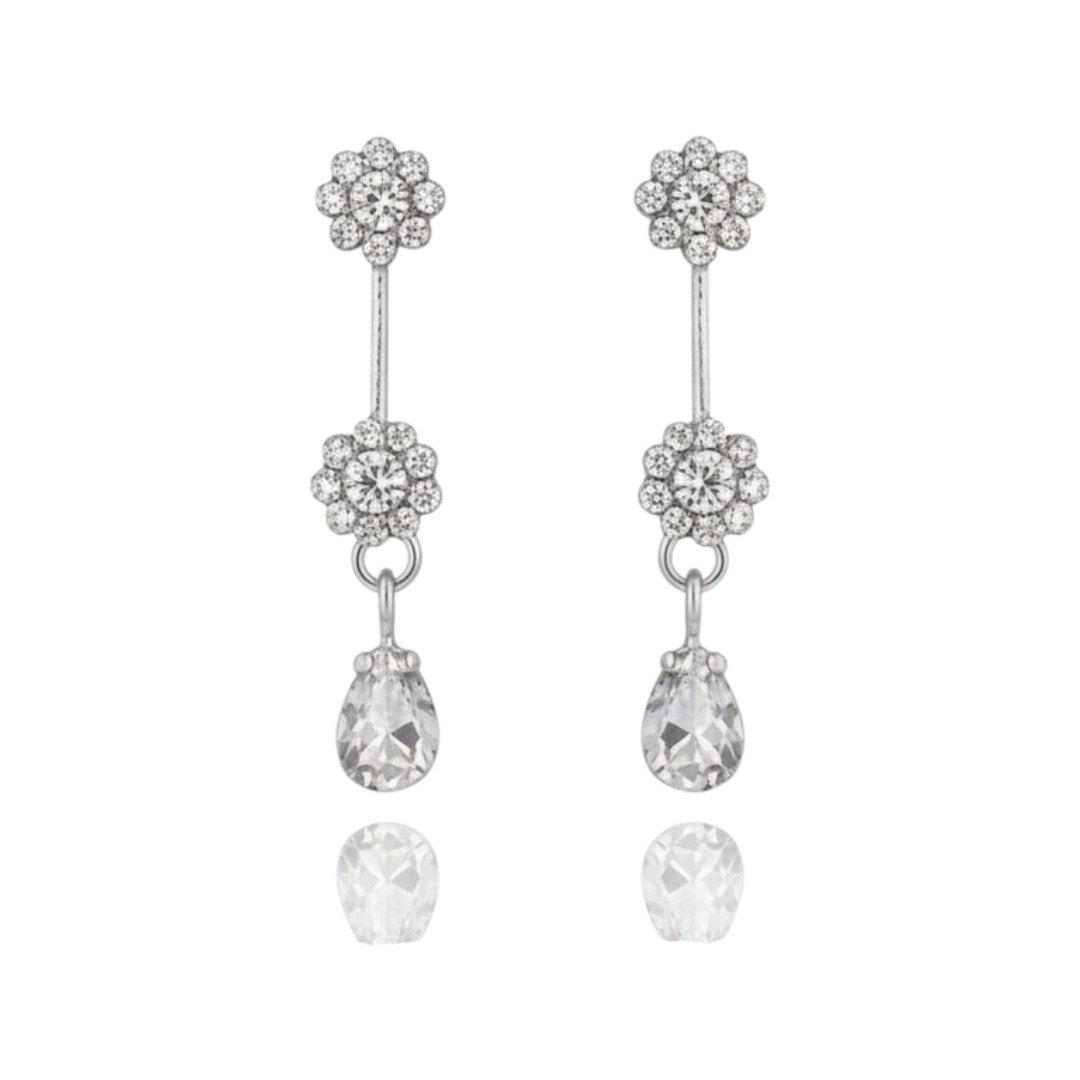Elegant floral necklace set with matching earrings, silver-plated with crystal details.