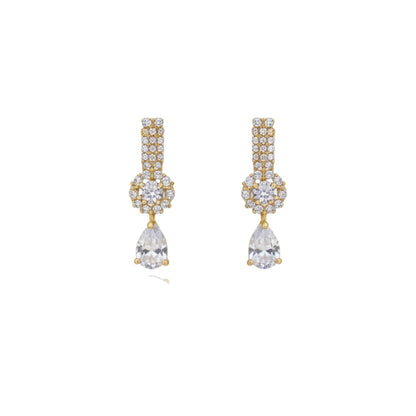 "Gold-plated floral diamond necklace set with matching earrings displayed on red velvet stand – ideal for weddings and festive occasions."