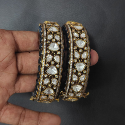 Elegant gold-plated Kundan bangles with black enamel and white stones – bridal designer kada for women