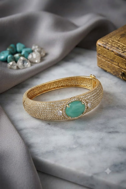 Mint green stone AD studded gold tone designer kada with sparkling white stones