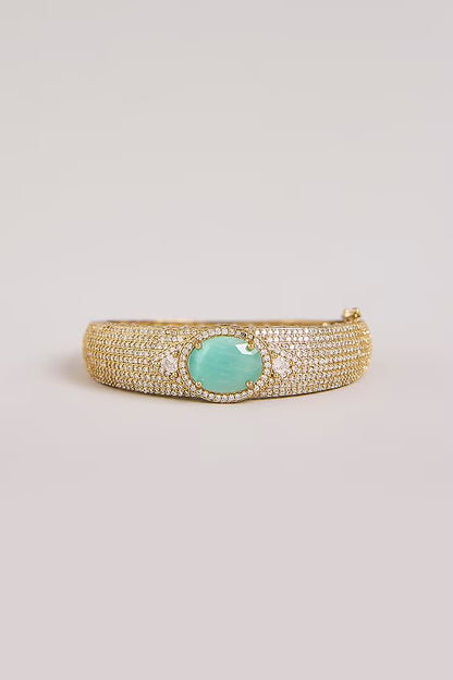 Mint green stone AD studded gold tone designer kada with sparkling white stones