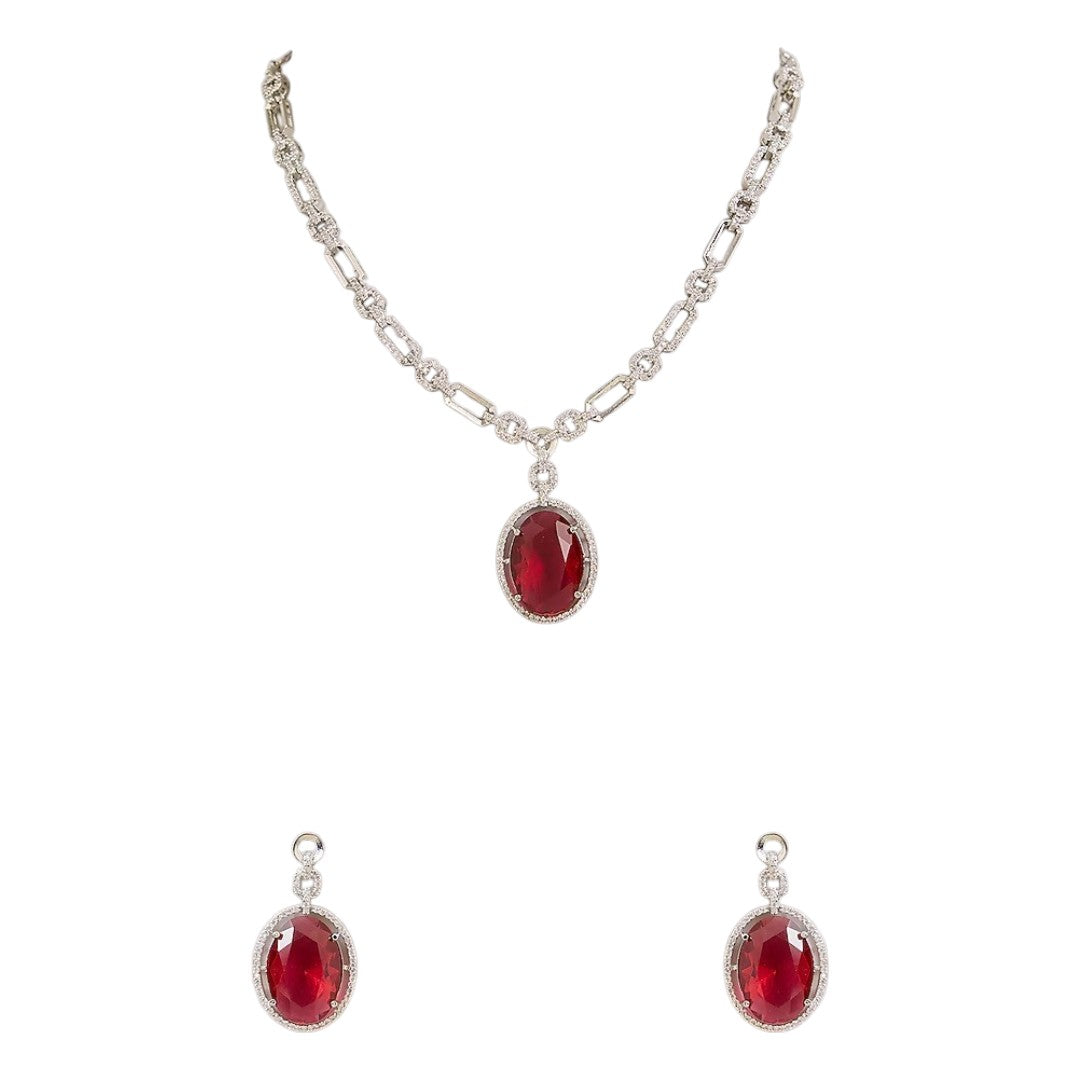 Silver plated American Diamond necklace set with ruby red oval pendant and matching drop earrings