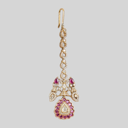 Gold finish American diamond maang tikka with ruby pink oval stone medallion, clear pear centre stone, zircon teardrop chain and ruby pink pear accents – Auraa Trends