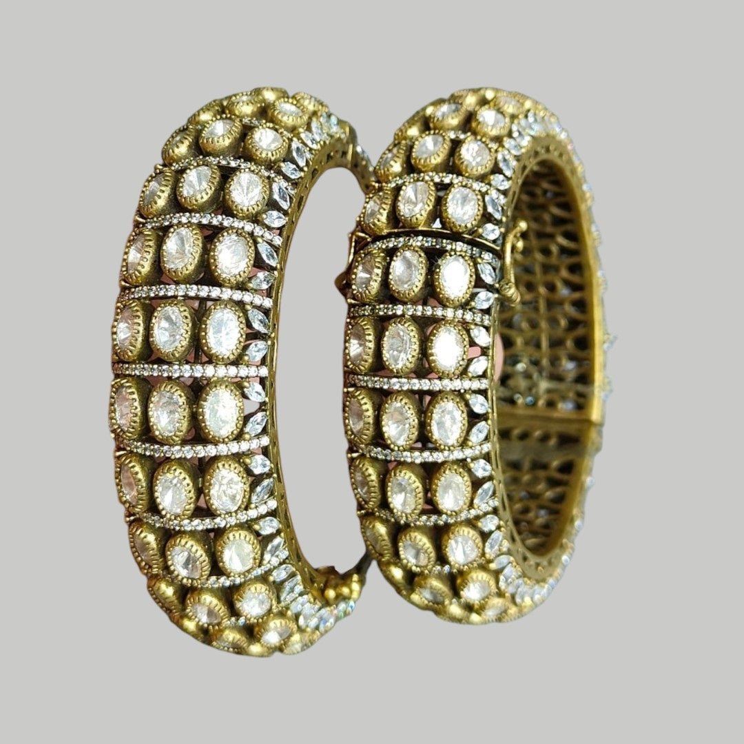 Elegant Gold - Plated Diamond - Style Bridal Bangle Set with Sparkling Stones - Auraa Trends - Bangles -  - Auraa Trends - Gold - plated bridal bangles with sparkling clear stones in a diamond - style pattern, perfect for weddings and special occasions.