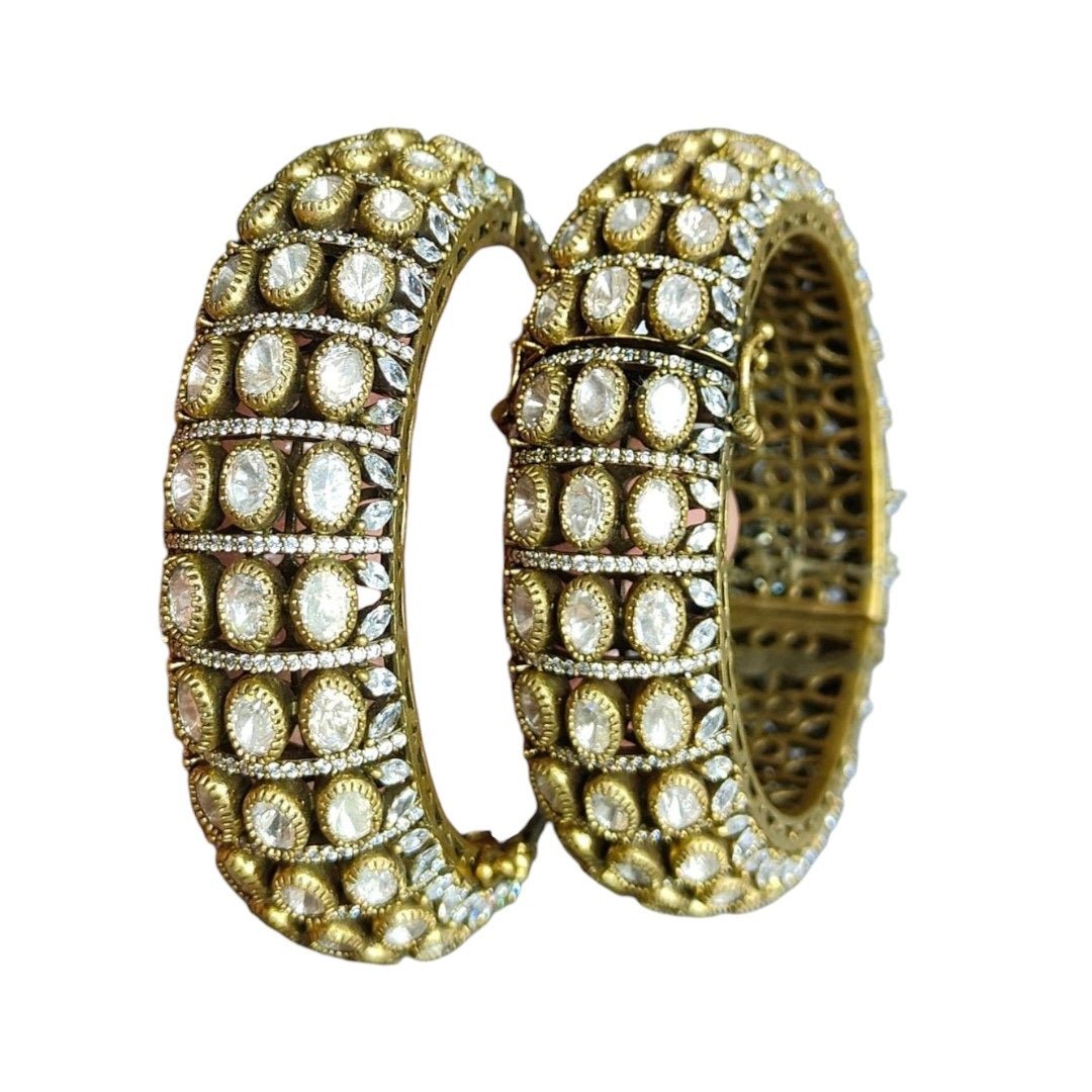 Elegant Gold - Plated Diamond - Style Bridal Bangle Set with Sparkling Stones - Auraa Trends - Bangles -  - Auraa Trends - Gold - plated bridal bangles with sparkling clear stones in a diamond - style pattern, perfect for weddings and special occasions.
