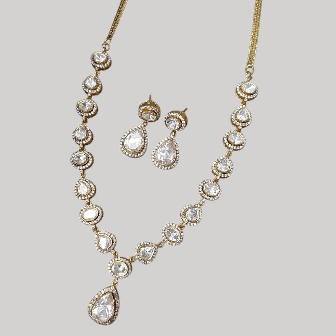 Elegant Kundan - Style White Stone Necklace Set - Auraa Trends - Necklace Set -  - Auraa Trends - "Gold - plated kundan - style necklace set with white teardrop and oval stones, including matching earrings – ideal for weddings, parties, and traditional functions.