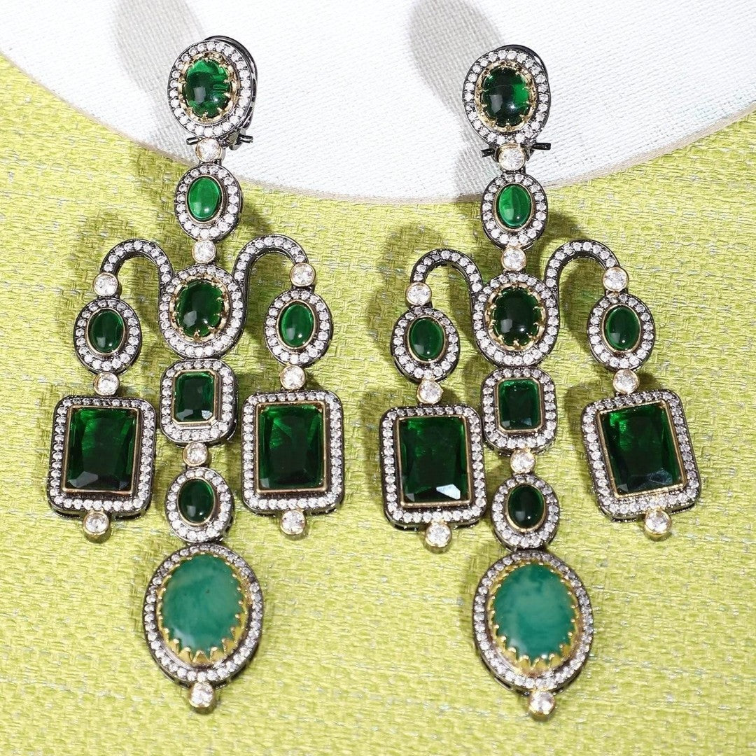 Emerald green Victorian chandelier earrings with kundan zircon stonework and oxidised finish