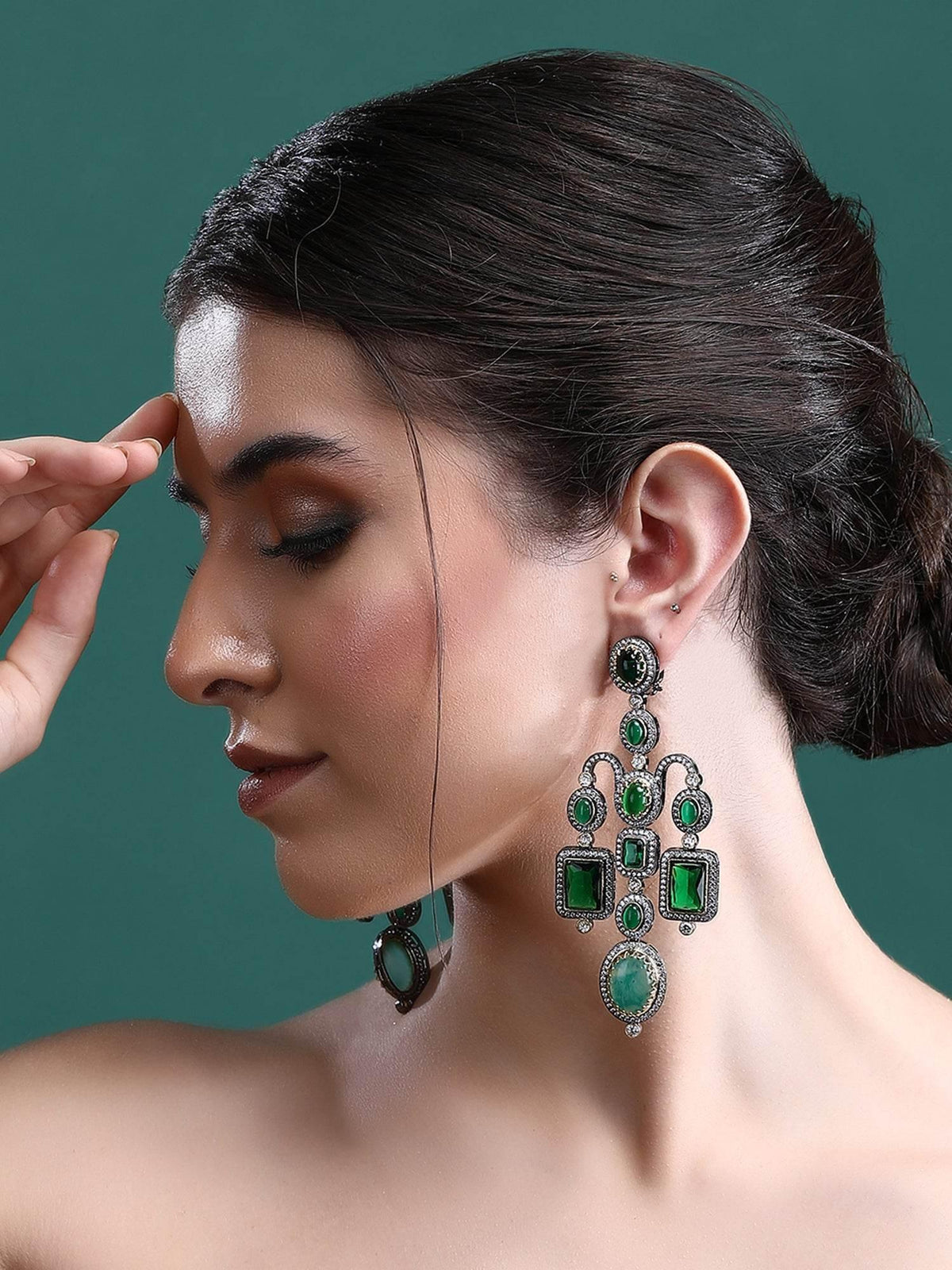 Emerald green Victorian chandelier earrings with kundan zircon stonework and oxidised finish