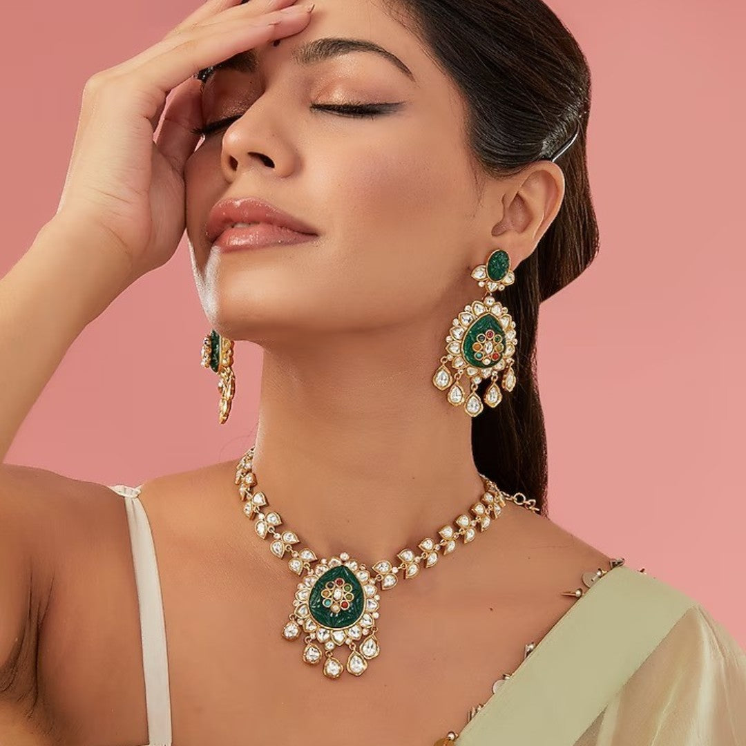 Kundan polki long necklace set with carved emerald pendant and matching earrings