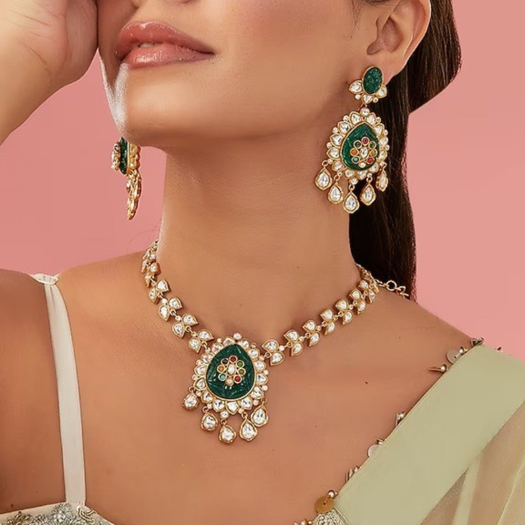 Kundan polki long necklace set with carved emerald pendant and matching earrings