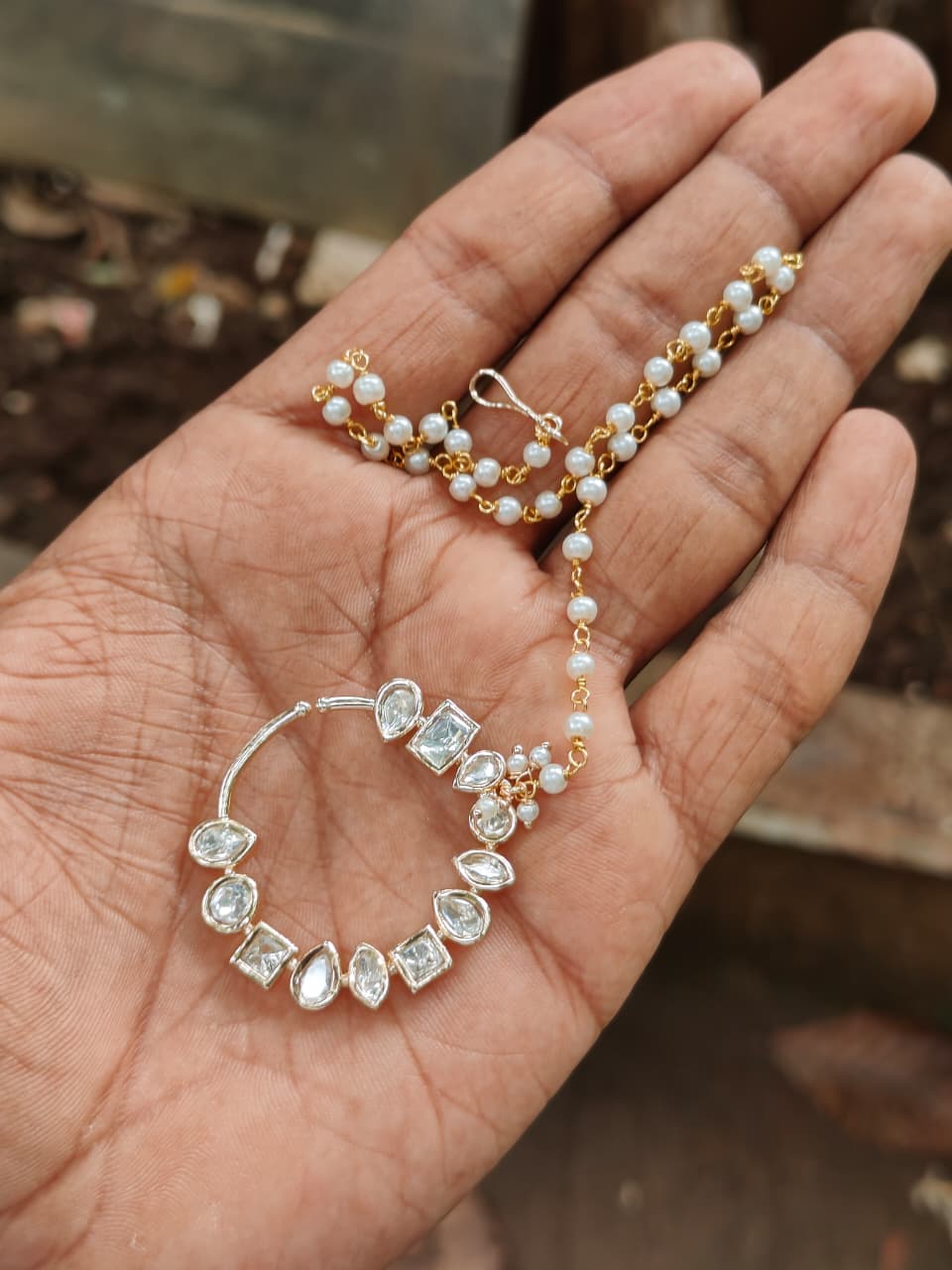 Kundan polki nath with pearl chain and hair hook for bridal nose ring look