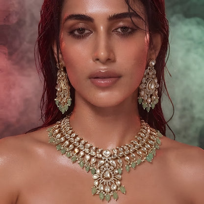 Mint green Kundan necklace set with white stones and matching earrings