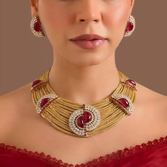 Gold plated ruby red multi-strand choker necklace set with American diamond half-moon medallions and matching earrings