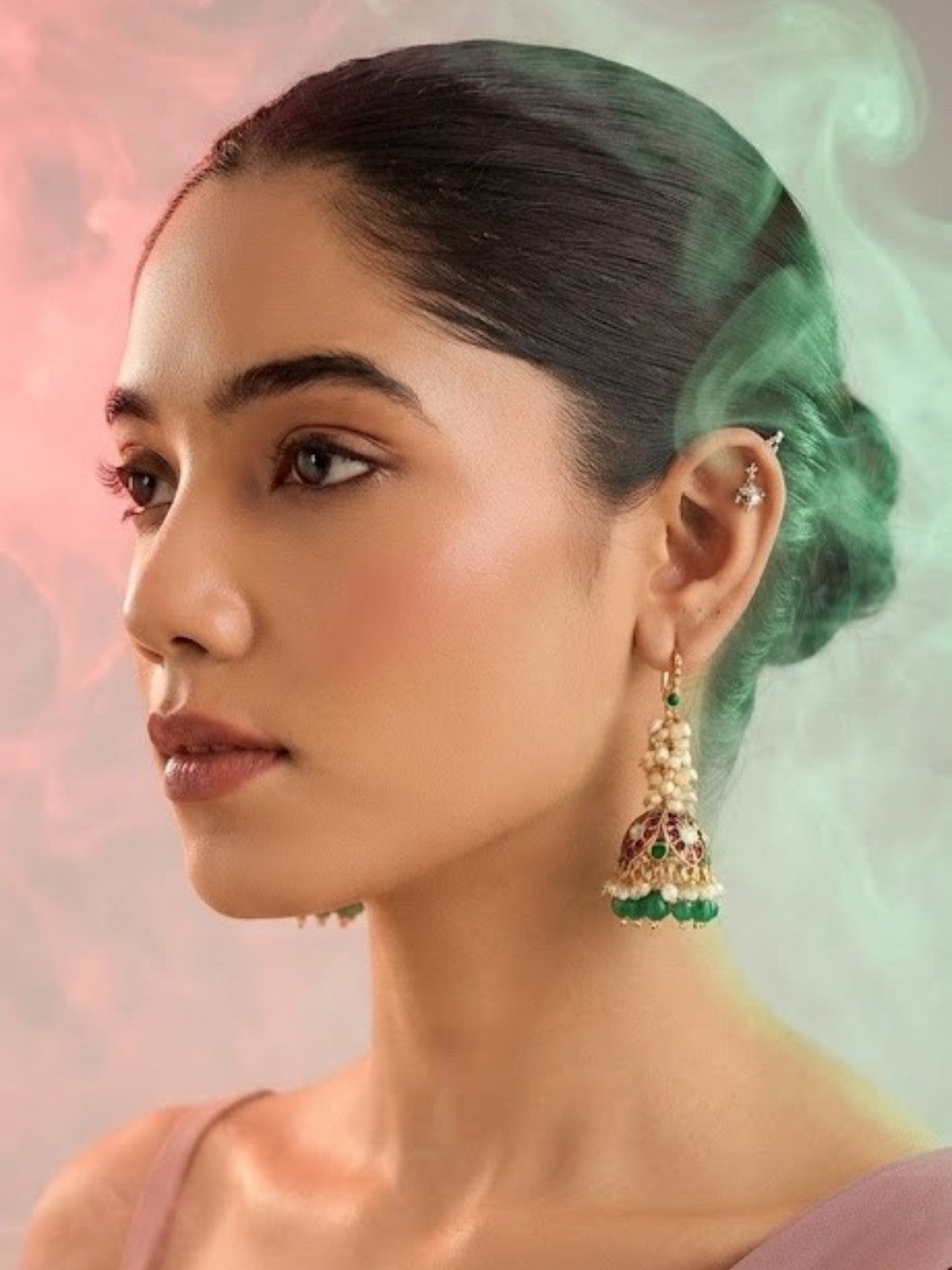 Antique gold jhumka earrings with rice pearl cluster, ruby pink floral dome and green bead drops
