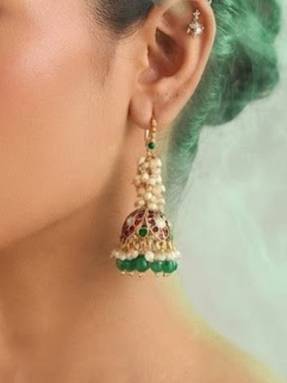 Antique gold jhumka earrings with rice pearl cluster, ruby pink floral dome and green bead drops