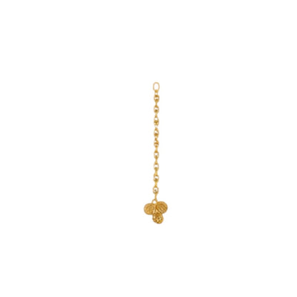 Traditional gold-plated necklace set with floral motifs and matching earrings displayed on red stand