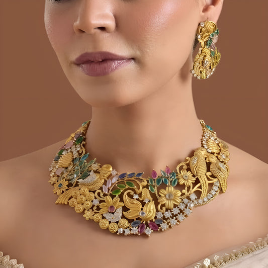 Matching gold bird motif earring with multicolour stones and chain