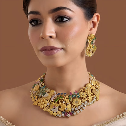 Matching gold bird motif earring with multicolour stones and chain