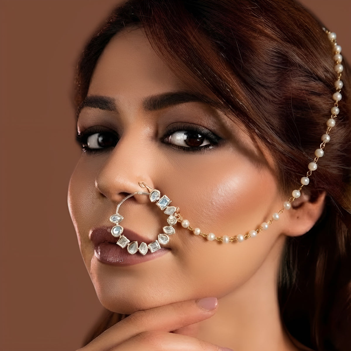 Kundan polki nath with pearl chain and hair hook for bridal nose ring look