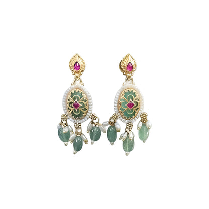Gold plated mint green oval medallion necklace set with pink stones, green bead and pearl drops and matching earrings on a blue bust